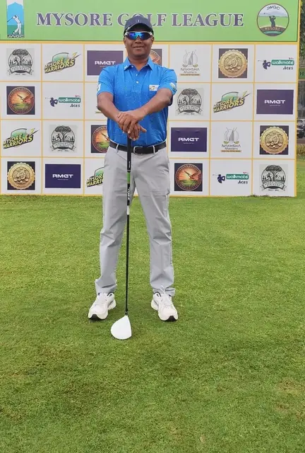 Tigers player at the Mysore Golf League sponsor wall